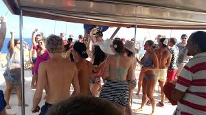 friends dancing on the boat party
